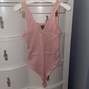 pink body suit